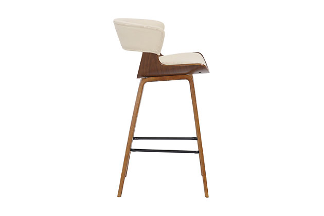 Add a work of art to your beautiful home with the Jagger counter height bar stool. This features a mid-century modern aesthetic that can blend into any home decor, providing an inviting furniture piece for you and your guests. The smooth shape and clean lines of the Jagger are accompanied by soft, sleek faux leather upholstery. The Jagger counter height bar stool is crafted with durable wood construction and incorporates a convenient square footrest for extra support. The Jagger is available in your choice of cream or brown faux leather with walnut wood finish or gray faux leather with a black brushed wood finish.Stable and sturdy - this stool provides stability with its strong 4-leg base giving you a sturdy foundation to sit upon for hours. The square metal footrest is ideal for propping your feet up while socializing or eating at your kitchen island or pub table. In addition, this stool has a weight capacity of 250 lbs. | CONVENIENT DESIGN – The beautiful armless design allows you to pull this stool up as close as needed to your kitchen counter, island, bar or pub table. The stationary seat allows for total comfort and serves as a safety precaution for children. Never worry about your seat moving while you are seated comfortably in the Jagger bar stool. | Upgraded fabric - these stools are upholstered in a luxurious faux leather that is soft to the touch and comfortable to sit on for hours on end. Make clean up a breeze and easily wipe away any spills or messes in seconds allowing you more time to enjoy and less time cleaning. | COUNTER HEIGHT – The Jagger stools are an ideal counter height. The seat height for these stools is 26 inches and they fit perfectly with a 35” – 37” high island, counter or table. With no arms to worry about, you’re able to pull the stool in as close as needed ma for an optimal dining experience.