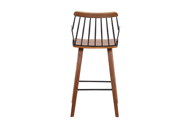Offer casual seating to your guests with the Micah 26-inch walnut and black metal counter height bar stool. The Micah is a perfect furniture addition to any home and easily pulls up to any kitchen island or pub table. The warm walnut wood finish paired with the modern black metal accents are sure to please in a farmhouse décor setting but the Micah can also transition into any design theme. The footrest and metal back lend structural reinforcement and allow for hours of comfortable seating for your guests. This classic spindle back design has a modern twist in it that will remain timeless for years to come.Stable and sturdy - this stool provides stability with its strong 4-leg base giving you a stable foundation to sit upon for hours. The square metal footrest is ideal for propping your feet up while socializing or eating at your kitchen island or pub table. In addition, this stool has a weight capacity of 250 lbs. | CONVENIENT DESIGN – The beautiful low arm design allows you to pull this stool up as close as needed to your kitchen counter, island, bar or pub table. The stationary seat allows for total comfort and serves as a safety precaution for small children. Never worry about your seat moving while you are seated comfortably in the Micah bar stool. | COUNTER HEIGHT – The Micah stool is an ideal counter height. The seat height for these stools is 26 inches and they fit perfectly with a 35” – 37” high island, counter, or table. With no arms to worry about, you’re able to pull the stool in as close as needed making for an optimal dining experience. | UNIVERSAL STYLE – The simplistic design of the Micah is its greatest feature. The Micah can easily transition from a modern farmhouse, to a modern, to a rustic design theme with ease. The metal spindle style back is reminiscent of a classic Windsor style but the bent wood legs lend themselves to the mid-century modern era and when blending them together, you get the best of both worlds and a transitional style stool that is a perfect fit for any home.