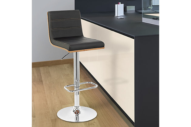 The contemporary-style Aubrey bar stool features adjustable height and 360-degree swivel functionality, ma it a good fit for the kitchen counter, home bar area, or any gathering area. Its chrome finish and walnut wood veneer are complemented by a faux leather seat and back to blend easily with any color scheme and room decor. The sturdy metal pedestal includes a footrest for added leg support. The Aubrey easily adjusts from counter height to bar height.Made of metal, wood and faux leather | Frame with chrome finish | Seat with black upholstery | Walnut veneer finish on back | 360-degree swivel allows mobility | Footrest offers leg support | Adjusts from counter height to bar height | Assembly required