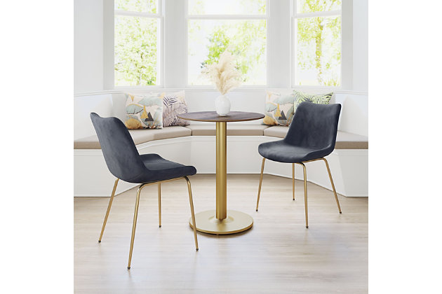 This dining chair mixes glam and maximalist design to enhance any space, from modern to boho chic. With a firm seat and back upholstered in smooth velvet fabric, and a solid steel frame with goldtone finish, this piece takes form and function to another level. Perfectly suited for any dining room, home office or bedroom.Set of 2 | Made of engineered wood, polyester and steel | Black velvet upholstery | Legs with electroplated goldtone finish | Weight capacity 325 pounds | Assembly required