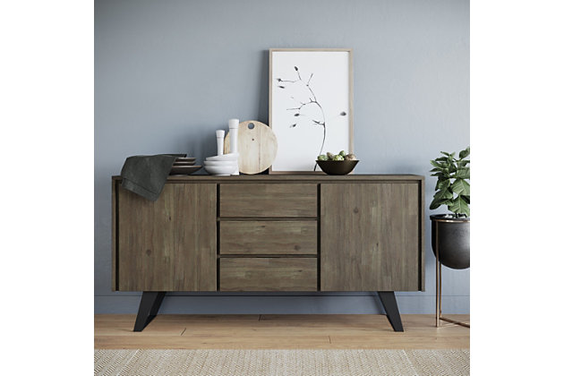 Elevate modern dining with the clean lines of this industrial-style sideboard buffet, handcrafted from solid wood and metal. The refined design provides generous storage behind drawers and doors with hidden hand pulls, creating a streamlined look that showcases the distressed gray finish. Angled metal legs provide a mixed-material accent.Made of acacia wood and metal | Handcrafted | Hand-finished in distressed gray | Sturdy metal angled legs | 3 smooth-gliding drawers | Discreet hand pulls | 2 doors with 2 adjustable shelves | Assembly required