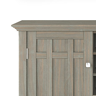 Need help in the dining room? This rustic sideboard buffet and wine rack is up to the job in a casual way. You'll find the moulded tabletop, beaded drawer fronts and sides, cabinets, wine rack and shelves handy for organizing dining essentials and keeping them within reach. It's hand-finished in gray with protective lacquer to accentuate and highlight the grain and uniqueness of each piece. This multi-functional storage cabinet can be used in the living room, family room or dining room.DIMENSIONS: 17" D x 54" W x 36" H | Handcrafted with care using the finest quality solid wood | Hand-finished in a Distressed Grey and a protective NC lacquer to accentuate and highlight the grain and the uniqueness of each piece of furniture. | Multi-Functional storage cabinet can be used in living room, family room and dining room | Features two (2) central drawers with metal glides, two (2) side doors that open to large storage spaces with two (2) shelves each and a twelve (12) bottle wine storage rack. | Transitional style includes molded table top, beaded drawer fronts and sides, solid panel doors and Bronze rounded square knobs | Assembly Required | We believe in creating excellent, high quality products made from the finest materials at an affordable price. Every one of our products come with a 1-year warranty and easy returns if you are not satisfied.