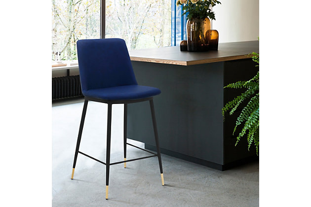 The Armen Living Messi 26” Modern Faux Leather and Metal Counter Bar Stool is the perfect stylish and sleek seating option for your beautiful home. The soft faux leather upholstery features plush foam padding for the most comfortable seat cushion. The high chair back offers excellent lumbar support that keeps your back properly aligned and feeling great! The beautiful black metal legs are accented by gold highlights, which add a look of refinement to this piece. The Messi Barstool is offered in your choice of blue, cream, and gray.Versatile style - the messina bar stool is the best option for any household. With a unique design and an aesthetic that can fit into most home decors, this is the chair for you! | Comfortable design - this stool was designed with ergonomic principles; shaping around your back with a wide seat for extra room. The soft foam-padded cushions offer extreme comfort, which helps to support and relax your back and body. | Enhanced fabric - these stools are upholstered in luxurious faux leather that is delicate on your body, but tough on spills and messes. This versatile fabric gives you the luxury to spend time on the more important things in life. | Built to last - this stool provides stability with its strong metal 4-leg base, giving you a stable foundation that will always offer optimal comfort. The metal square footrest is ideal for propping your feet up while socializing or dining at your kitchen island or pub table. In addition, this stool has a weight capacity of 250 lbs.
