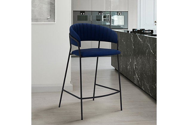 The Armen Living Nara Modern Faux Leather and Metal Counter Height Bar Stool is simplicity and refinement placed into one item. The faux leather upholstery is flawlessly wrapped around the rounded seatback, while the upholstery on the seat covers the incredibly soft foam-padded cushion. The metal frame of the Nara is built with durability and sturdiness in mind, giving you years of enjoyment. The incorporated square footrest is an extra feature added to give you maximum comfort. The legs are tipped with rubber caps to prevent scratching or sliding on floors and help keep you home in pristine condition. The versatile look of the Nara allows it to blend into any room in your home. The Nara is available in your choice of blue, cream, and gray and frame color of black or gold.Modern seating - a preferred stool for spaces of all types, the nara offers a supportive place to rest while delving deep into conversation or sipping a steaming cup of tea or coffee. | Enhanced fabric - these stools are upholstered in luxurious faux leather that is delicate on your body, but tough on spills and messes. This versatile fabric gives you the luxury to spend time on the more important things in life. | Comfortable design - this bar stool was designed with soft foam-padded cushions that offer extreme comfort and keeps you in a constant state of relaxation. Once you sit down, you won’t want to get up! | Built to last - this stool provides stability with its strong metal 4-leg base, giving you a stable foundation that will always offer optimal comfort. The metal square footrest is ideal for propping your feet up while socializing or dining at your kitchen island or pub table. In addition, this stool has a weight capacity of 250 lbs.