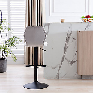 Contemporary style meets functionality with this gas lift counter stool. The stool's metal pedestal base features a curved footrest for optimal comfort with a sleek black powdercoat finish. The seat is upholstered in gray polyester velvet and adjusts between counter and bar height, making it the perfect piece for any kitchen, bar or seating area.Made of metal and fabric | Gray polyester velvet upholstery | Gas lift | Sturdy metal base and curved footrest with black powdercoat finish | Swivel seat | Spot clean | Assembly required