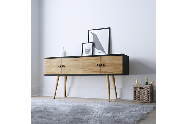 Mid-century modern at its very best, the Theodore sideboard brings the chic back to entertaining. It's beautifully crafted from natural wood, with Scandinavian-inspired splayed legs. A set of double cabinet doors on each side offers ample storage space for dinnerware, linens, books, albums and more. The sideboard's smooth base allows for displaying picture frames, artful sculptures, vases, a mail tray and more. Hang a unique mirror or modern art above it for a bold showstopping statement.Made with engineered wood   | Scandinavian-inspired, solid wood splayed legs for fashion and durability  | Includes 2 concealed cubby spaces | Beautiful latitude detailed line design  | Round wooden doorknobs | Mid-century modern sideboard for entryway and china storage in dining room  | Use as a TV stand for your bedroom; Accommodates most flat-panel TVs up to 50"
 | Assembly required