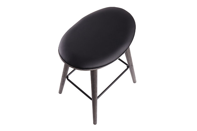 Ultimate comfort meets the ultimate style in the Saddle Counter Stool by LumiSource. With a generous contoured upholstered seat atop tapered wood legs and metal footrest, this fixed-base stool puts you in the saddle. Available in a variety of finishes and upholstery options.Fixed counter height | Stylish faux leather upholstery | Tapered wood legs | Includes two counter stools