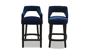 Elegantly modern, the Moderne Upholstered Bar Stool Collection by Jennifer Taylor Home features plush, comfortable seating that doesn’t skimp on style. Fully upholstered with luxurious velvet atop a medium-firm foam seat, these 26" high bar stools work great with kitchen counters, high tables, or anywhere you need seating with a little extra height. Attractive nailhead accents line the arms and back of this stool, and a brass kickplate helps prevent scuffs and scratches to the dark espresso legs. Every purchase includes 2 bar stools for the perfect pairing for your home.Handmade by master furniture craftsmen for the highest level of quality | Sturdy frame of kiln-dried solid birchwood and layered plywood provides excellent support and stability | Brass-plated footrest provides comfortable seating and resists scuffs and scratches | Hand-applied iron nailhead accents are finished in antique brass to provide classic chic | 2 matching stools included for perfect bar stool pairing