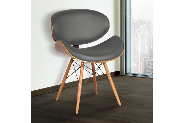 The Armen Living Cassie mid-century dining chair offers an optimal degree of comfort and style, perfect for the contemporary dining or living room. This modern dining chair features a softly curved back framed in a walnut wood finish and upholstered with plush faux leather. The Eiffel leg design features metal wires which enhance the support and durability of the tapered walnut wood legs. The Cassie even comes with floor protectors to ensure stability and minimize the risk of floor scratches. The thick medium-firm density cushion seat and back will provide you with all-day comfort. The medium-high open lower back is ideal for posture alignment and an unmatched support for days on end. The foundation of the product is supported by solid walnut wood for a chic and stylish aesthetic without comprising the practicality and functionality of this item. This item is a versatile piece that can be ideal for dining, kitchen, or even home office desk chairs. This product ships in one box with an easy and quick set up. We stand by the quality, the craftsmanship, and the integrity of our product by offering a 1-year warranty for all our products. The Cassie's upholstered seat comes in two sleek colors choices: black and gray. Product Dimensions: 21"W x 20"D x 31"H SH: 18"Mid-century modern and contemporary but can blend into any design providing an inviting centerpiece for your guests | Solid walnut wood finish for durability and longevity | Crafted to perfection for years of enjoyment | Great for kitchen, dining, home office space, commercial setting or any living space in your home | Spot clean | Assembly required | Comes with a standard 1-year limited warranty