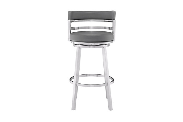 The Armen Living Madrid  armless barstool features a unique aesthetic that is certain to work well in any modern household. The Madrid’s durable brushed stainless steel frame is accompanied beautifully by its grey faux leather seat and back. The upholstered low back is rounded, providing the user with exceptional support while the 360 degree swivel seat allows for enhanced mobility. The Madrid’s contemporary straight leg design endows the barstool with a chic quality that is further accented by the inclusion of a round footrest. The Madrid’s legs are tipped with floor protectors, assuring that the barstool will not slip on or scratch hardwood or tile floors. The beautiful Madrid is available in two industry standard sizes; 26 inch counter and 30 inch bar height.Sturdy construction for years of enjoyment | Available in two industry standard sizes; 26 inch counter and 30 inch bar height | Round foot rest adds a nice stylistic accent while balancing the barstool | Product dimensions: 20"w x 21"d x 34.5"h sh: 26" | Round footrest with brushed chrome-tone finish | Floor protectors | Available in 26" counter and 30" bar height | Assembly required | Comes with a standard 1-year limited warranty