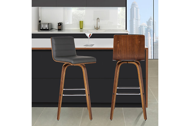 Indulge in luxury with the Vienna Contemporary Swivel Barstool by Armen Living. It is beautifully designed with a sturdy metal framed footrest in expertly crafted in curved Walnut Wood finish, upholstered with grey Pu upholstery and black brushed wood back. This piece provides both versatile style and comfort with a Modern design that can easily be integrated into your home’s current décor. While appearing stationary, the Vienna features a 360-degree swivel feature for maximum mobility. The plush padded seat with high density foam will provide you with all day comfort. The curved wood medium high back is ideal for posture alignment and an unmatched support for days on end. The foundation of the product is supported by wood and strong metal footrest for a chic and stylish aesthetic without comprising practicality and functionality of this item. This product ships in one box with easy and quick set up. We stand by the quality, the craftsmanship and the integrity of our product by offer 1-year warranty for all our products. We want our customers enjoy our product and we will always be there to help with our top-notch customer service support. Product Dimensions: 17"W x 20"D x 39"H SH: 30""

Excellent choice for a Modern, and Contemporary dining and Kitchen setting. Available in 26" counter Height and 30" bar Height options in brown, Gray or Cream or. It is also available Grey upholstery with black brushed finish wood in 26" or 30".The vienna barstool radiates with contemporary styling, comfortable curved seat and low back with walnut wood | 360° swivel, foam padded seat, sturdy chromed metal footrest | Available in 26" counter height and 30" bar height options | Sturdy construction for years of enjoyment | Footrest with chrome-tone finish | 360-degree swivel | 250-pound weight capacity | Comes with a standard 1-year limited warranty | Assembly required