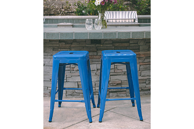 Add a modern minimalist look to your home or business with this versatile backless bar stool. The seat area features a convenient handhold, while floor glides on the legs prevent floor scratches. This set of two stools is made of durable powdercoated steel, with footrests on four sides to promote relaxation and good posture. Stackable and space-saving, these sleek bar stools include cross bracing beneath the seat for additional stability.Set of 2 | Made of durable powdercoated steel | Stackable design for efficient storage where space is limited  | Convenient for kitchens, garages, workstations, bars and restaurants | Floor glides on base of legs prevent floor scratches | Footrests on four sides promote relaxation and good posture