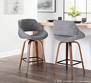 The wide and welcoming seat of the LumiSource Fabrico Counter Stool beckons one to sit and relax. A curved back and contoured upholstered seat is accented by flared walnut wood swivel legs that add to the stylish yet comfortable design. Available in a variety of upholstery colors, choose the one that suits your space best.Mid-century modern styling | Fixed counter height | Square built-in footrest with black finish | Padded seat and backrest for added comfort | Includes two counter stools