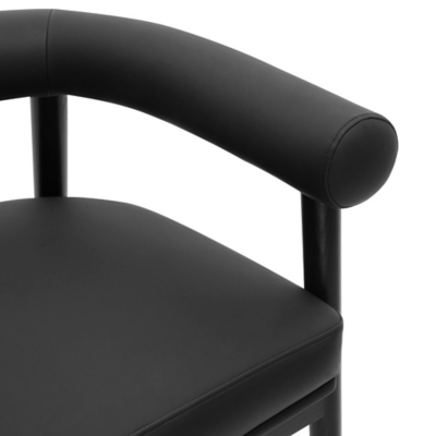 Close-up of bar stool armrest and upholstery seam