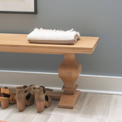 Close-up of bench top with folded blanket