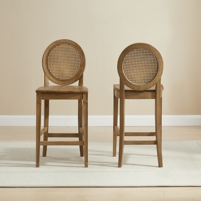 Two wooden counter height stools with caned round backs