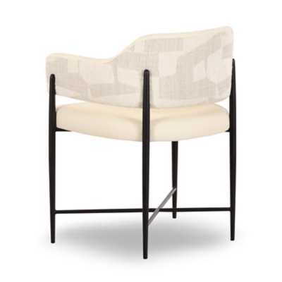 Cream armless dining chair with a curved back and metal frame
