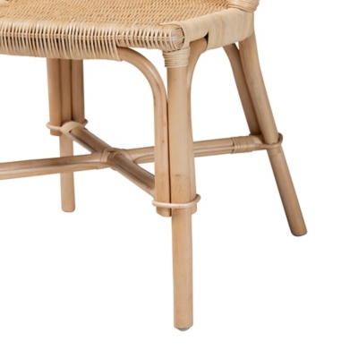 Close-up of chair leg joint and rattan construction