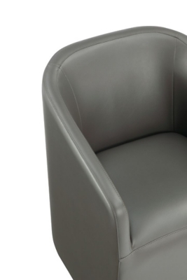 Close-up of armchair corner stitching and leather texture