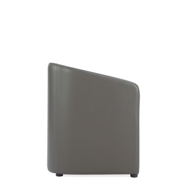 Plain grey armchair isolated on white background with small feet
