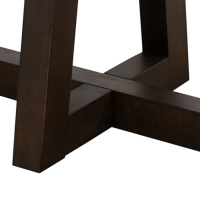 Close-up of the bottom intersection of table legs showing cross support