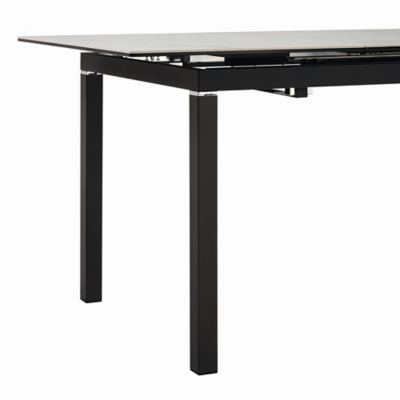 Close-up of table leg and frame junction with glossy black finish.