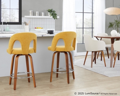 Two yellow LumiSource Ava stools at counter