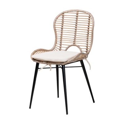 Side view of a single Brenna dining chair with woven back and black legs
