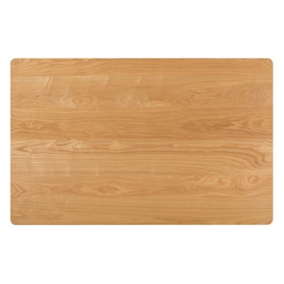 Top-down close-up of the natural wood grain on the dining table surface
