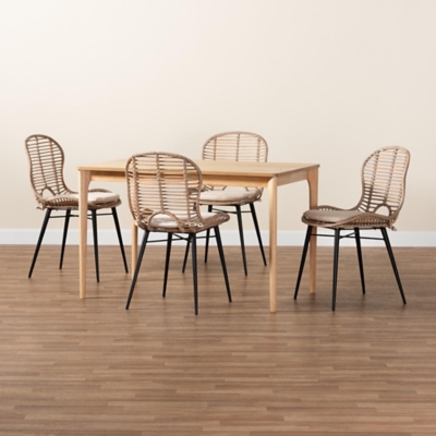 Front view of the dining table and four chairs set on a wood floor
