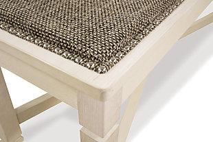 The beauty of the Bolanburg upholstered dining bench is something to savor. Serving up comfort and flair, this generously scaled bench entices with a cushioned seat covered in a heavy woven fabric that complements the antiqued white finish.Made of veneers, wood and engineered wood | Antiqued white finish | Heavy woven fabric upholstered seat | Assembly required | Estimated Assembly Time: 15 Minutes
