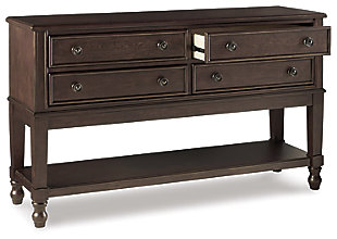 You love the look of traditional furniture—as long as it’s not overly formal. Behold the best of both worlds in the Adinton dining room server. The combination of classic and up-to-date design proves that opposites really do attract. Sleek lines and a rich finish showcase its craftsmanship, while starburst veneer with a cross banded border attest to its style. Proving that it’s practical as well as pretty, four smooth-gliding drawers and an expansive open shelf keep it feeling casual for today's lifestyle.Made of wood, birch veneers and engineered wood | Warm brown finish | 4 smooth-gliding drawers with dovetail construction | Antiqued brass-tone hardware | Fixed lower shelf | Assembly required | Estimated Assembly Time: 30 Minutes
