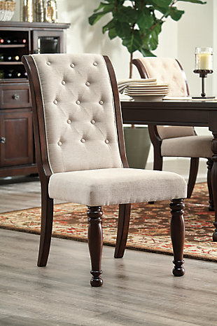 Satisfying your taste for traditional furnishings, the Porter upholstered dining room chair is elegant, without looking fussy. Rolled-back design gives the classic profile a touch of flair and drama. Chair’s back is upholstered on both sides for a posh feel and welcome warmth.Made of wood and engineered wood | Hand-finished | Cushioned back and seat | Button tufting | Polyester upholstery (front and back) | Assembly required | Excluded from promotional discounts and coupons | Estimated Assembly Time: 30 Minutes
