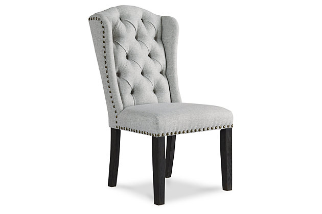 With its fashion-forward take on timeless wingback styling, the Jeanette upholstered dining chair is a feast for the senses. Richly neutral linen-weave upholstery is punctuated with nailhead trim for trendy flair. Deep button tufting enhances the luxurious look and feel that’s designed to make gathering around the table an easy-elegant experience.Made of wood | Polyester upholstery over foam cushioned seat | Button tufted back | Nailhead trim | Assembly required | Estimated Assembly Time: 30 Minutes