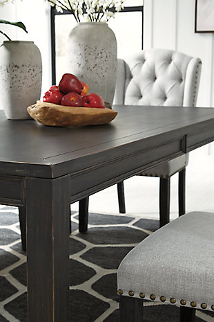 With its fashion-forward take on farmhouse styling, the Jeanette dining room table is a feast for the senses. A dry vintage black finish infuses the table with wonderfully weathered charm. The table’s clean-lined Parsons styling is a timeless classic choice that works so well with different chair styles, should you decide to mix it up.Made of wood, veneers and engineered wood | Dry vintage black finish | Distressed aesthetic | Table seats up to 6 | Dining chairs sold separately | Assembly required | Estimated Assembly Time: 30 Minutes