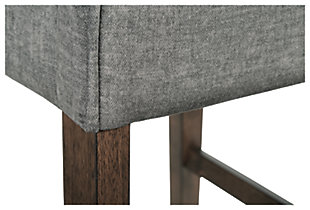 Sometimes it’s the little details that make all the difference. With its rich take on contemporary style, the Raehurst dining chair is a feast for the senses. Notice the curvaceous high back, flared legs and side stretchers that strike a pose. Adding to the subtle sophistication: a textural charcoal gray fabric wrapping the chair from front to back.Made of wood | Dark warm brown finish | Textured polyester upholstery in charcoal gray over foam cushion | Assembly required | Estimated Assembly Time: 30 Minutes