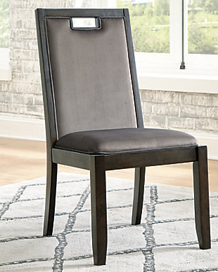The Hyndell dining chair serves up clean-lined contemporary style with a sleek, linear profile and rich espresso finish. Fresh elements including a peekaboo handle and sumptuous gray faux velvet upholstery keep this chair relevant and on trend. Rest easy, this decadent comfort comes at such an affordable price.Made of wood | Cushioned back and seat with faux velvet polyester upholstery | Assembly required | Estimated Assembly Time: 45 Minutes