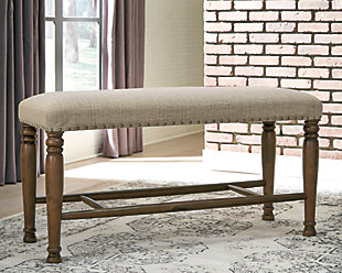 The Lettner upholstered dining room bench brings a tempting mix of comfort and flair to the table. This easy-elegant bench with substantial stretcher design is covered in an oatmeal-colored fabric that complements anything and everything. Nailhead trim is so on trend.Made of wood | Oatmeal-color polyester fabric over foam cushioned seat | Nailhead trim | Assembly required | Estimated Assembly Time: 15 Minutes