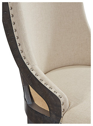Yearning for a fresh helping of casual farmhouse design? Have your fill with the exquisitely crafted Baylow upholstered dining chair. Truly a labor of love, this deliciously different host chair is “undressed” to impress with a semi-deconstructed aesthetic. Contoured wraparound silhouette includes an exposed wood frame beautified with a distressed black vintage washed finish. Two styles of upholstery: an earthy burlap on the back and plush beige fabric on the front make for a cool contrast.Made of wood | Distressed black vintage washed finish | Semi-deconstructed design | Two-tone upholstery (burlap back; beige polyester seat) | Foam cushioning | Nailhead trim | Assembly required | Estimated Assembly Time: 30 Minutes