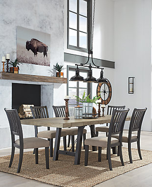 Yearning for a fresh helping of casual farmhouse design? Have your fill with the exquisitely crafted Baylow 7-piece dining set. Truly a labor of love, the intricate double extension leaf top table with thick planked look wows with its reclaimed lumber aesthetic. Sturdy and structural, the table’s trestle base with distressed black vintage washed finish and metal support brackets provides such a cool contrast. Four dining chairs, with their stylized rake-back design, take an elegant twist on a classic. The chair’s wood frame is beautified with a distressed black vintage washed finish and the comfortably cushioned seat is covered in plush beige fabric for neutral sophistication.Includes table and 6 chairs | Made of wood, acacia veneer, engineered wood, metal and polyester | Table base with metal support brackets | Table with contrasting light top resembling the look and feel of reclaimed lumber | Table with double extension leaf top with thick planked look | Table extends by pulling both ends and dropping in leaves | Table seats up to 8 | Table and chair with distressed black vintage washed finish | Chair with beige polyester upholstery over foam cushion | Chair with rake-back design | Assembly required | Estimated Assembly Time: 210 Minutes