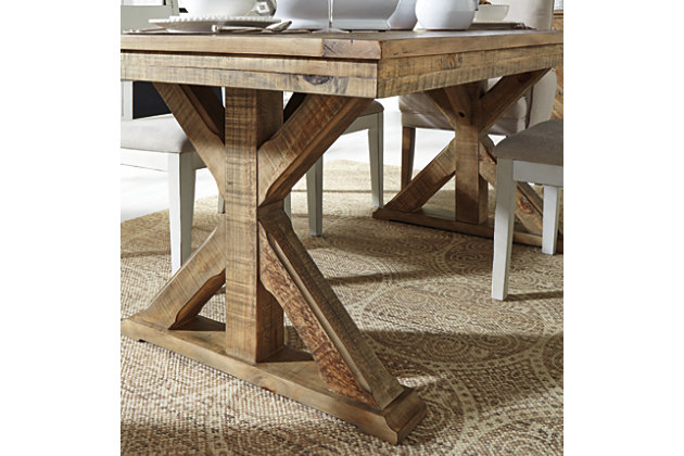 Grindleburg rectangular dining table is a well-made country cottage inspired piece. Crafted with reclaimed pine wood, it pays homage to natural materials. Farmhouse trestle base is a substantial foundation. Natural finish grounds the space with earthy élan. With room for six people, plenty of farm to table dinners are in order.Made of reclaimed wood, wood and engineered wood | Seats up to 6 | Assembly required | Estimated Assembly Time: 30 Minutes