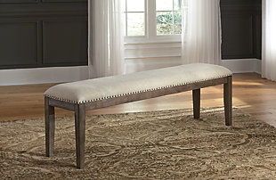 Homey. Hearty. Heavenly hued. Luring with a distressed weathered gray finish, the Johnelle dining room upholstered bench is sure to make your homestead feel that much more like home. Fresh and neutral linen-weave upholstery is punctuated with contrasting nailhead trim for added character.Made of solid wood | Distressed weathered gray finish | Polyester upholstery over foam cushioned seat | Contrasting nailhead trim | Assembly required | Estimated Assembly Time: 15 Minutes