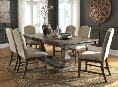 Johnelle Dining Table And 6 Chairs With Storage Set Ashley Furniture Homestore