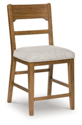 wooden chair backrest and frame close-up showing grain and curved back slat