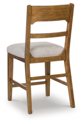 angled front view of wooden chair with upholstered seat