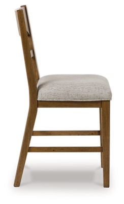 rear three-quarter view of wooden chair with upholstered seat