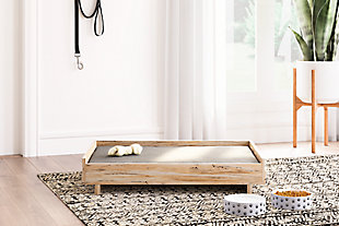 The perfect marriage of contemporary and casual style, the Piperton pet bed is a charming addition to your home. Indulge your favorite furry friend with a sleeping spot they can call their own. This pet bed coordinates beautifully with other bedroom and entertaining pieces in the series, for a curated look that's so doggone cute.Made of engineered wood (MDF/particleboard) and decorative laminate | Natural finish over replicated sugarberry woodgrain | Foam cushion with removable polyester cover | Assembly required
