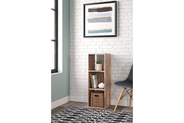 Keep clutter out from underfoot with the Piperton three-cube organizer. The natural finish over replicated sugarberry wood grain is warm and inviting, all while keeping your toys, knickknacks and other items stored away. The perfect marriage of style and function, this organizer is an ideal addition to any busy living space.Made with engineered wood (MDF/particleboard) and decorative laminate | Natural finish over replicated sugarberry wood grain | Can be used vertically or horizontally | Accommodates any 10.5" W x 10.5" D x 11" H storage bin | Assembly required | Estimated Assembly Time: 15 Minutes