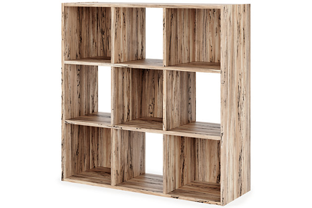 Keep clutter out from underfoot with the Piperton nine-cube organizer. The natural finish over replicated sugarberry wood grain is warm and inviting, all while keeping your toys, knickknacks and other items stored away. The perfect marriage of style and function, this organizer is an ideal addition to any busy living space.Made with engineered wood (MDF/particleboard) and decorative laminate | Natural finish over replicated sugarberry wood grain | Accommodates any 10.5" W x 10.5" D x 11" H storage bin | Assembly required | Estimated Assembly Time: 25 Minutes