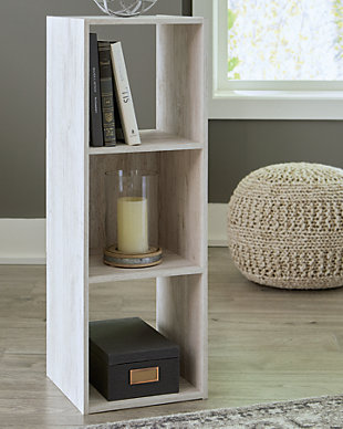 If it’s coastal chic or cottage quaint style you long for, the Paxberry whitewashed three-cube organizer invites you to go to town. Its distinctive weatherworn finish conveys an easy-breezy sensibility, perfect for a restful bedroom retreat. Open and closed backs make it abundantly practical.Made with engineered wood (MDF/particleboard) and decorative laminate | Whitewash replicated worn through paint with authentic touch | Can be used vertically or horizontally | Accommodates any 10.5W x 10.5D x 11H storage bin | Assembly required | Estimated Assembly Time: 15 Minutes